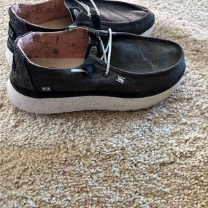 Hey Dude Women's Black and White Sneakers